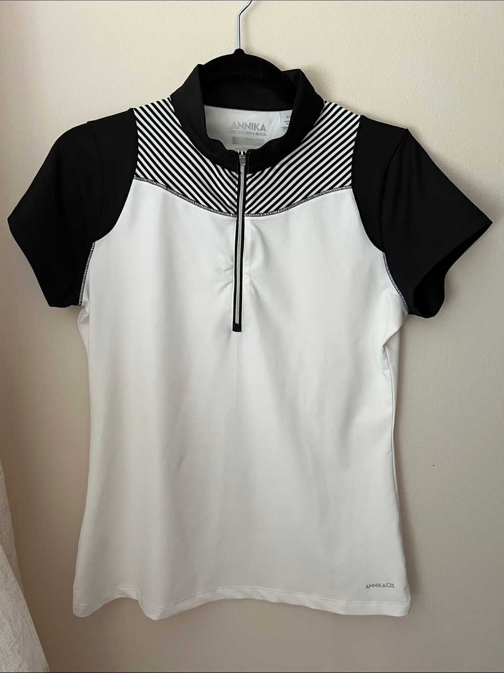 ANNIKA Black & White Short Sleeve Zip Golf Top